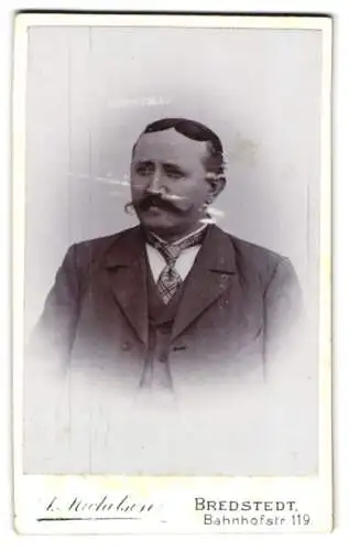 Fotografie A. Michelsen, Bredstedt, Bahnhofstrasse 119, Porträt eines Herrn mit Schnurrbart