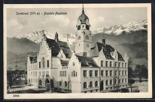 AK Innsbruck, Blick auf die Handelsakademie gegen die Alpen