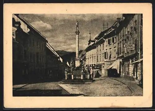 AK Wolfsberg, 1. Lavanttaler Handwerker-Ausstellung 1946, Strassenpartie mit Bäckerei Probst und Denkmal