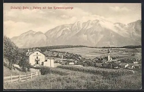 AK Natters, Stubaitalbahn, Blick auf die Kirche vor dem Karwendelgebirge