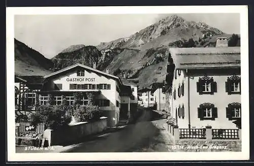 AK Stuben a. A., Strassenpartie am Gasthof Post