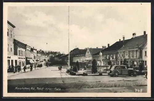 AK Amstetten /Nd., Platz mit Geschäften und Denkmal