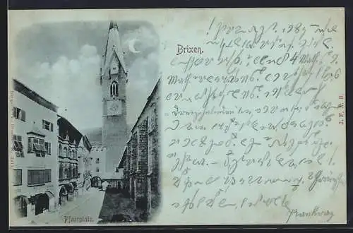 Mondschein-AK Brixen, Pfarrplatz mit Tor