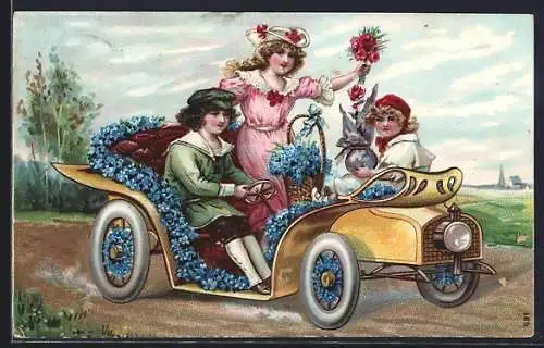 AK Junger Mann und zwei Damen mit Blumen im Auto