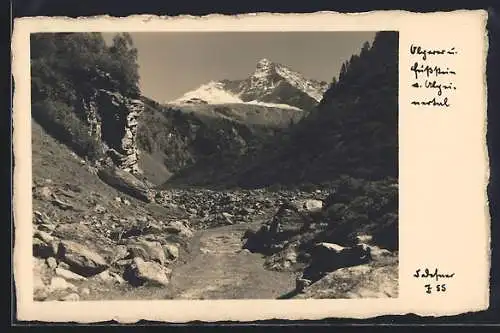 Foto-AK Adalbert Defner: Geröllweg mit Bergspitze im Hochgebirge