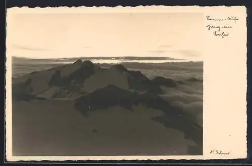 Foto-AK Adalbert Defner: Sonnenaufgang am Berggipfel