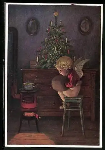 AK Weihnachtsengel sitzt mit Muff vor einem Weihnachtsbaum am Ofen