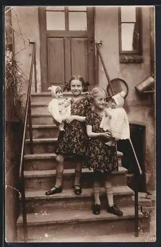 Foto-AK Stavenhagen, Kinder der Familie Ewald mit Puppen