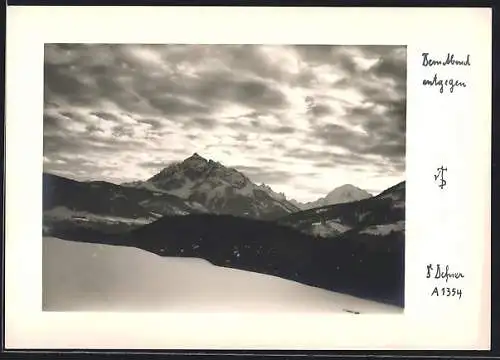 Foto-AK Adalbert Defner: Berglandschaft im Schnee am Abend