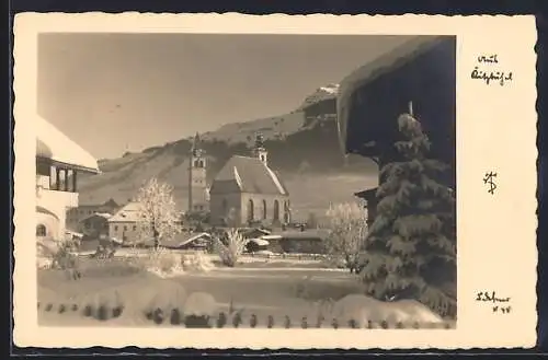 Foto-AK Adalbert Defner: Kitzbühel, Ortsansicht im Schnee