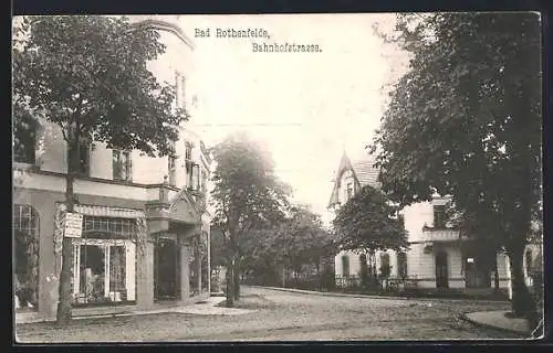 AK Bad Rothenfelde, Bahnhofstrasse mit Geschäft