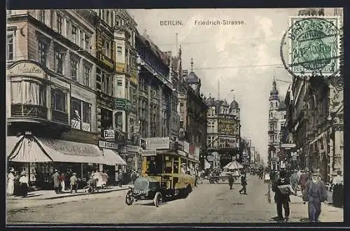 AK Berlin, Friedrich-Strasse mit Bussen, Geschäften und Menschen