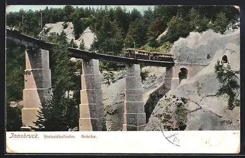 AK Innsbruck, österreichische Eisenbahn Stubaithalbahn auf einer Brücke