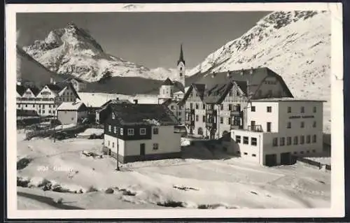 AK Galtür, Ortspartie mit Alpenhaus Fluchthorn im Winter