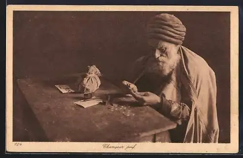 AK Jüdischer Geldwechsler sitzt an einem Tisch und zählt Münzen