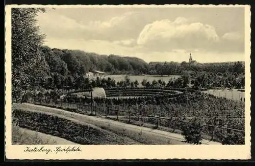 AK Insterburg, Sportplatz mit Blick zur Kirche, von einem Hang geseheen