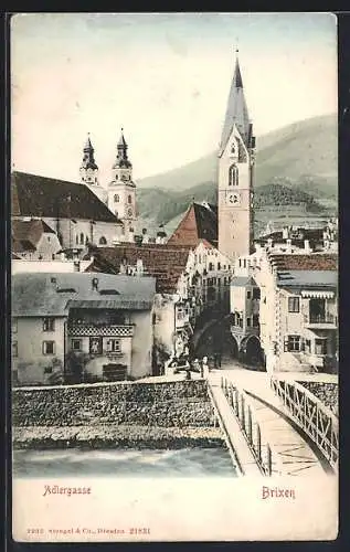 AK Brixen, Adlergasse von der Brücke aus, Strassenpartie mit Türmen