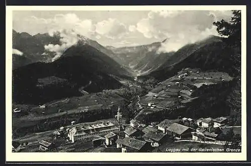 AK Maria Luggau, Ortsansicht aus der Vogelschau mit der italienischen Grenze