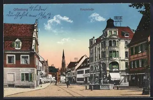 AK Offenburg, Hotel Schwarzer Adler und Einhorn-Apotheke in der Haupstrasse