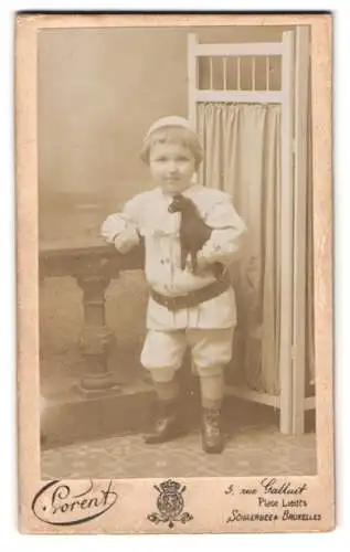 Fotografie Lorent, Schaerbeek, Rue Gallait 5, Porträt eines jungen Kindes mit Pferd