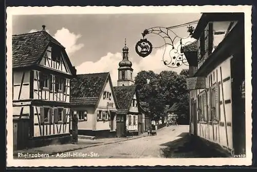 AK Rheinzabern, Strasse mit Gasthaus-Metzgerei Jakob Gilb u. Kirche