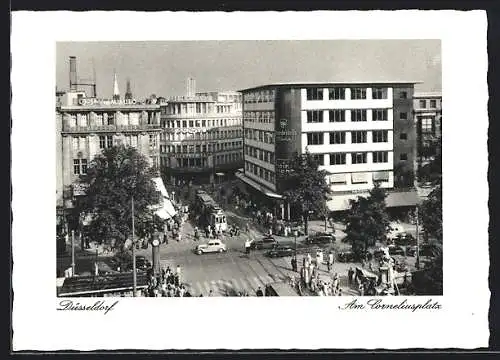 AK Düsseldorf, Geschäftshäuser am Corneliusplatz mit Strassenbahn