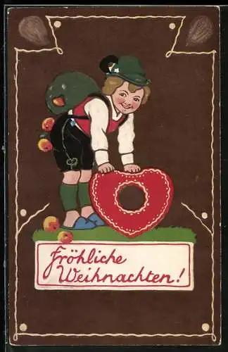 Künstler-AK Junge mit Lebkuchenherz auf einem Stück Lebkuchen, Fröhliche Weihnachten