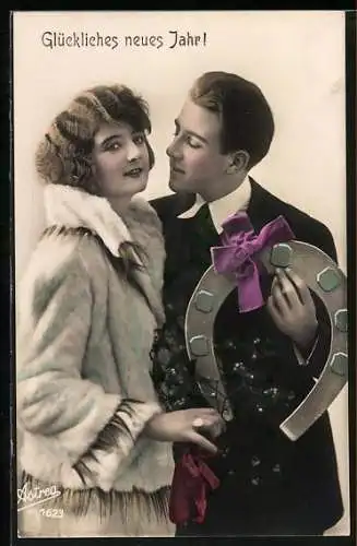 AK Mann und Frau mit grossem Hufeisen, Neujahr