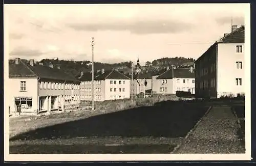 AK Berga /Elster, Ortspartie mit HO-Geschäft