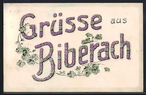 Künstler-AK Biberach / Riss, Schriftzug Grüsse aus Biberach aus Blumen, Kleeblätter