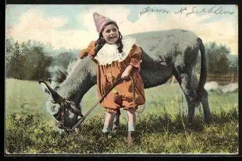 AK Kind mit einem Maultier auf der Wiese