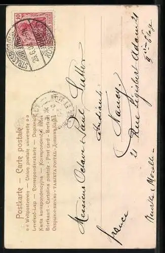 AK Reiter auf einem Schimmel beim Setzen über eine Hecke