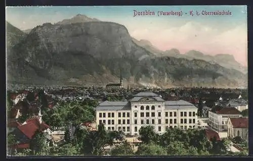 AK Dornbirn /Vorarlberg, K. k. Oberrealschule und Ort aus der Vogelschau