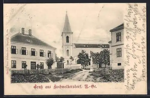 AK Hochwolkersdorf /N.-Oe., Strassenpartie mit Kirche und Denkmal