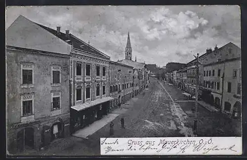 AK Mauerkirchen /O.-Ö., Strassenpartie mit Geschäften