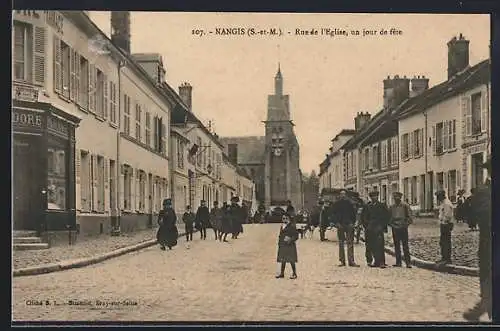 AK Nangis /S.-et-M., Rue de l`Église, un jour de fête