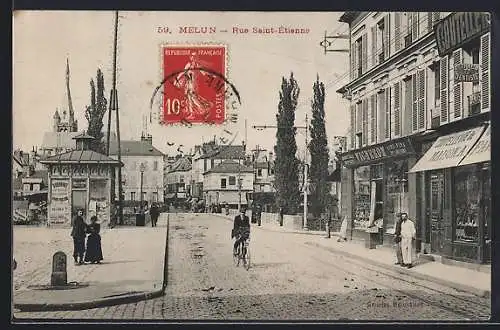 AK Melun, Rue Saint-Étienne avec cycliste et passants