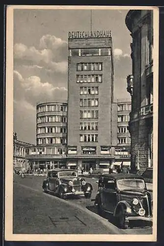AK Essen / Ruhr, Deutschlandhaus mit Strassenpartie und Autos