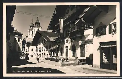 AK St. Johann in Tirol, Hotel Post mit Strasse u. Kirchtürmen