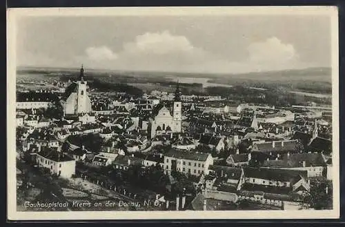 AK Krems an der Donau, Ortsansicht mit Kirche und Donau im Hintergrund