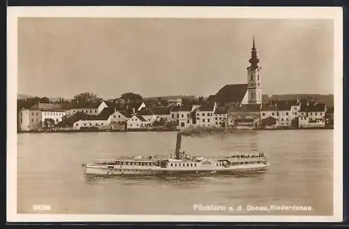 AK Pöchlarn a. d. Donau, Ortsansicht mit Kirche, Raddampfer auf der Donau