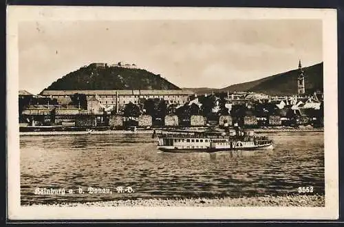 AK Hainburg a. d. Donau, Ortsansicht mit Kirche, Raddampfer auf der Donau