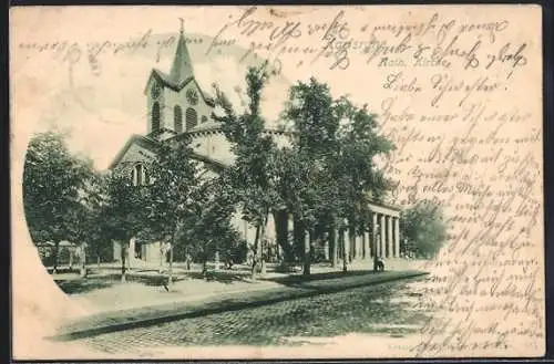 AK Karlsruhe i. B., auf der Strasse vor der katholischen Kirche
