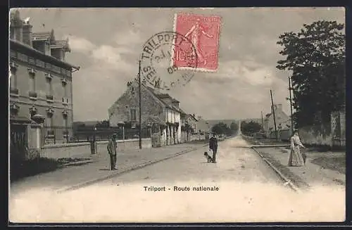 AK Trilport, Route nationale avec passants et bâtiments adjacents