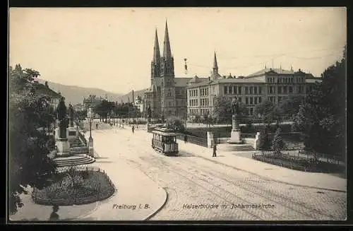 AK Freiburg / i.B., Kaiserbrücke mit Johanniskirche und Strassenbahn