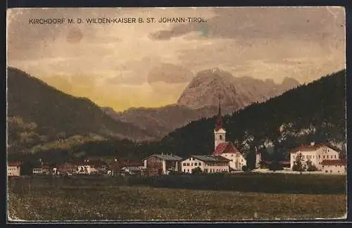 AK Kirchdorf /Tirol, Ortspanorama mit dem Wilden Kaiser