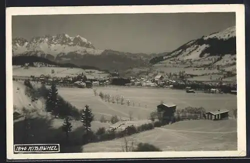 AK Kitzbühel, Ortsansicht mit Gipfelpanorama im Winter