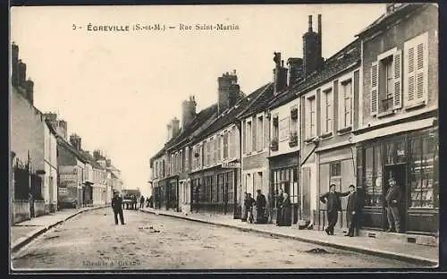 AK Égreville, Rue Saint-Martin mit Geschäften