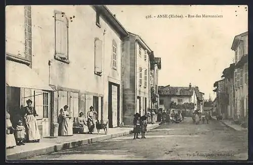 AK Anse, Rue des Marronniers, Strassenpartie im Ort