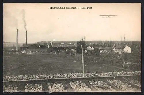 AK Rimaucourt /Hte-Marne, Les Forges avec chemin de fer et biplan dans le ciel